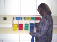 Cando Exercise Band - Rack - Horizontal - 5 Bin Universal W/ 5 50-Yd Rolls Latex Free Band (Y,R,G,B,Blk)