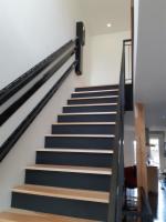 Showing lift rails matching staircase rails and risers